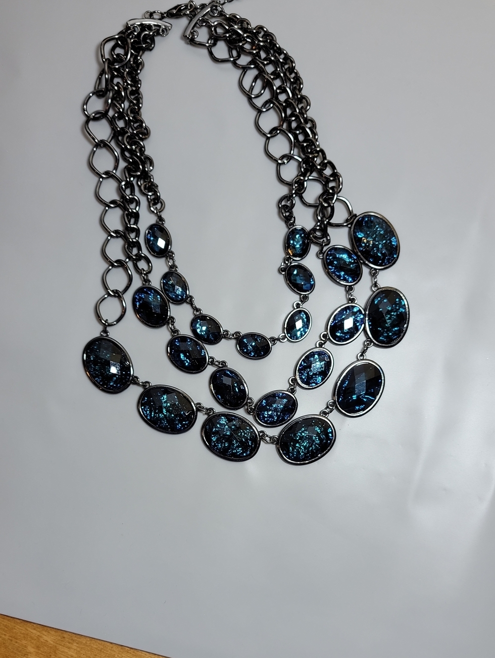 Three strands in gunmetal and blue stones necklace